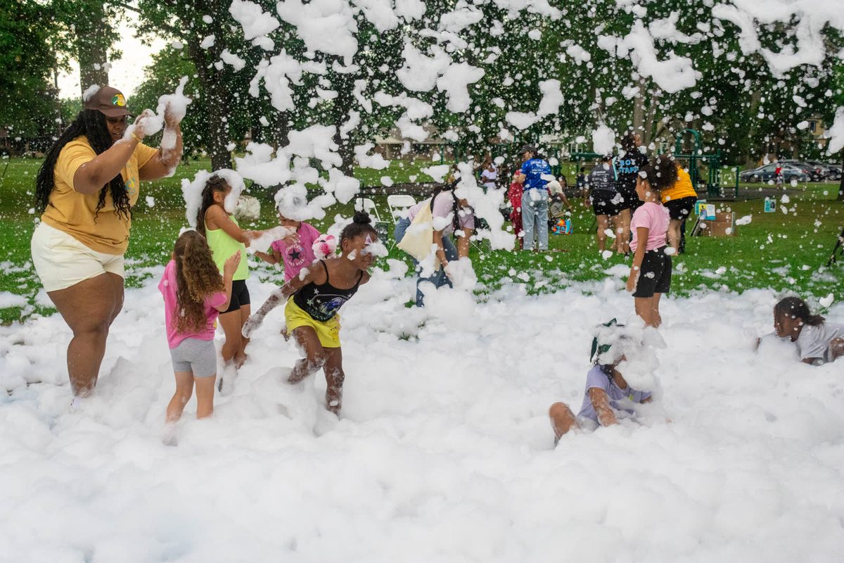 Kids playing in the foam party