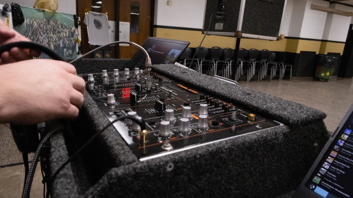Mixing board and laptop set up before a show