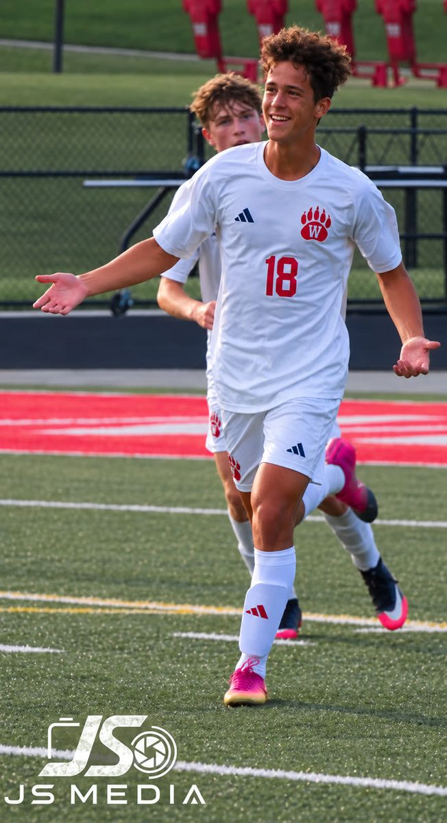 Wadsworth varsity soccer player number 18 celebrating a goal